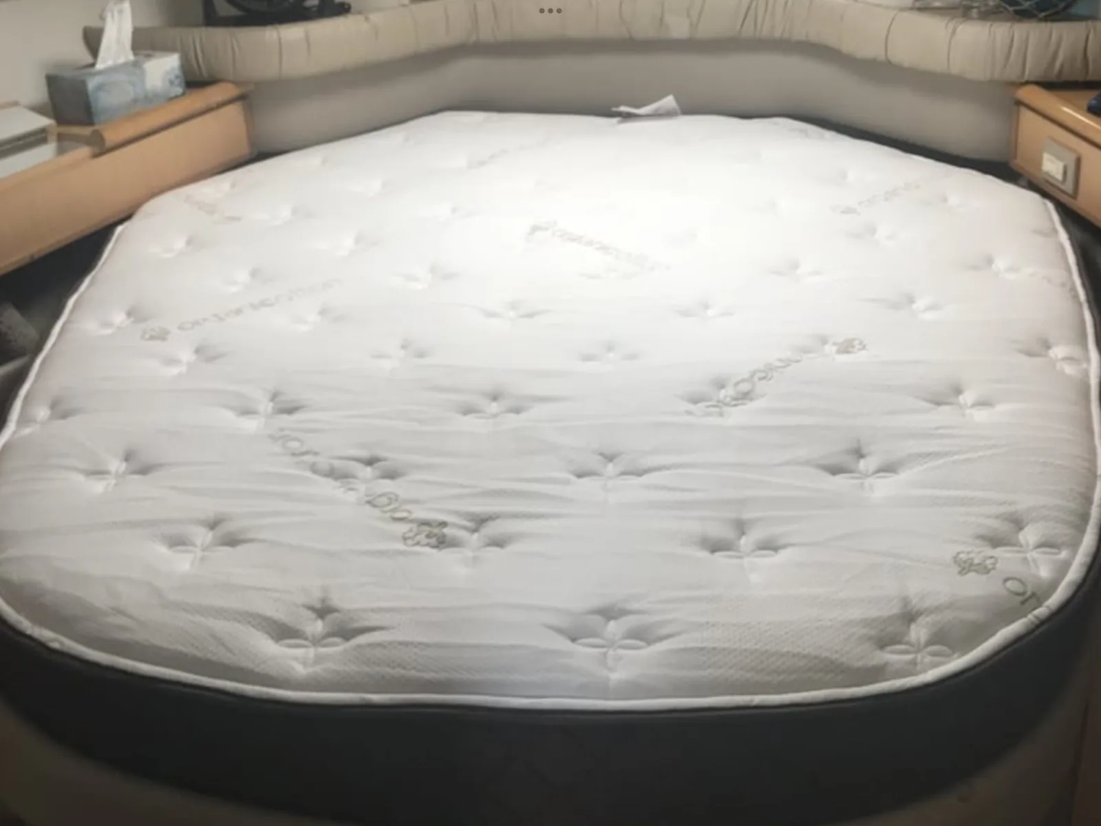 Custom boat mattress installed in a marine sleeping space