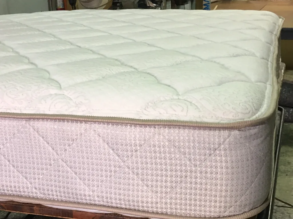 Spring mattress with stitched pillow-top finish from Maylin Mattress